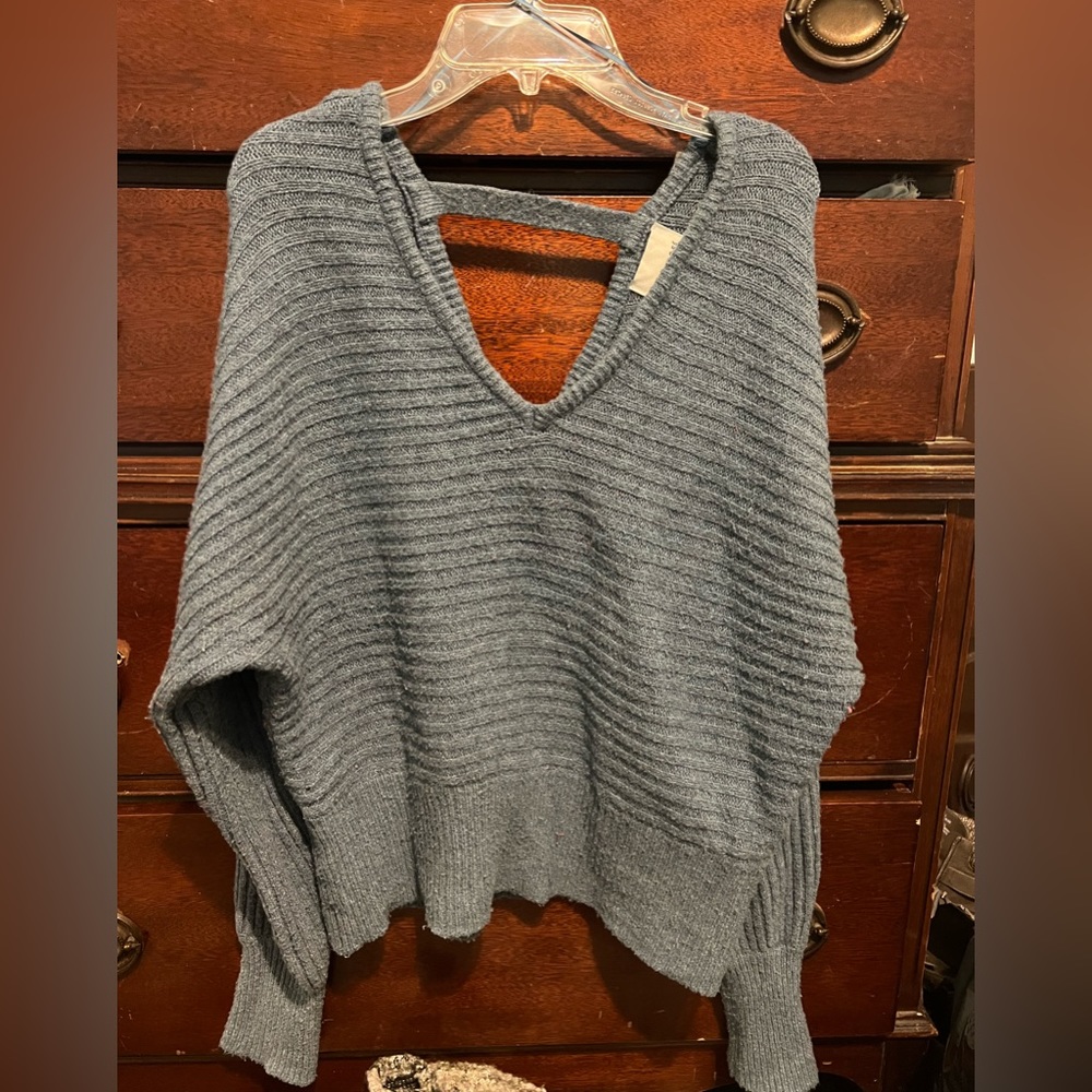 This soft blue sweater is a must have!